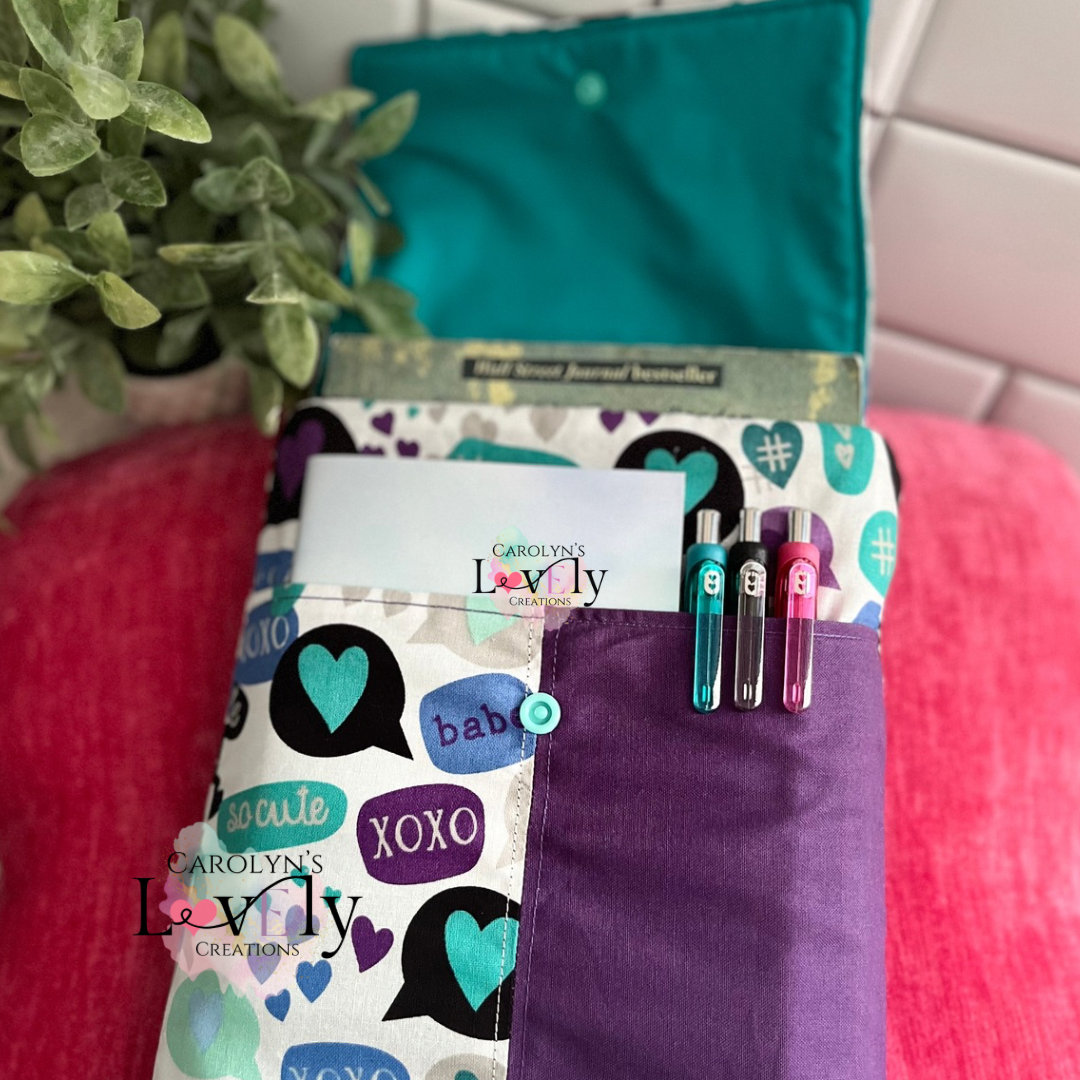 purple and teal fabric book sleeve